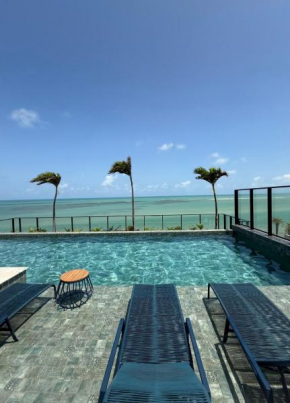 Flat sofisticado pé na areia do Caribessa